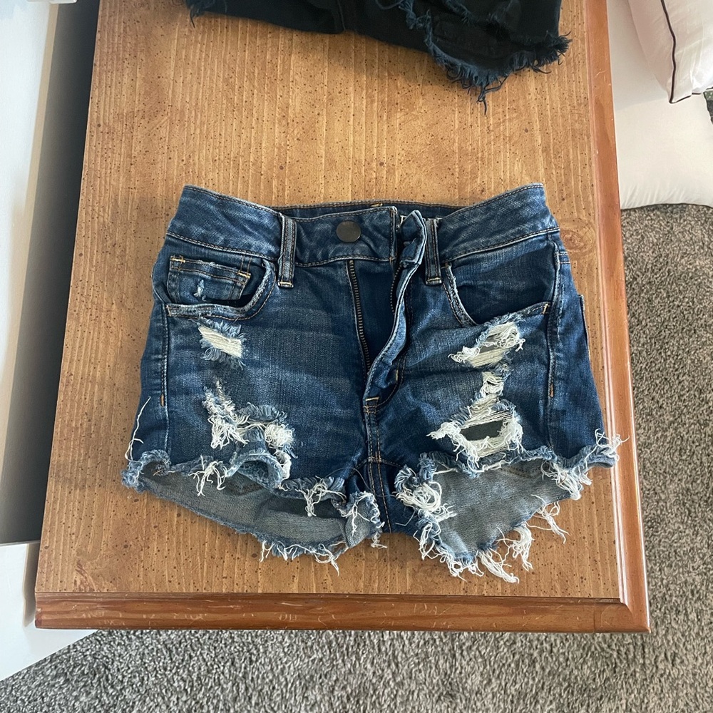 American Eagle Outfitters Super Stretch Hi-Rise Shortie Ripped Blue Jean Shorts